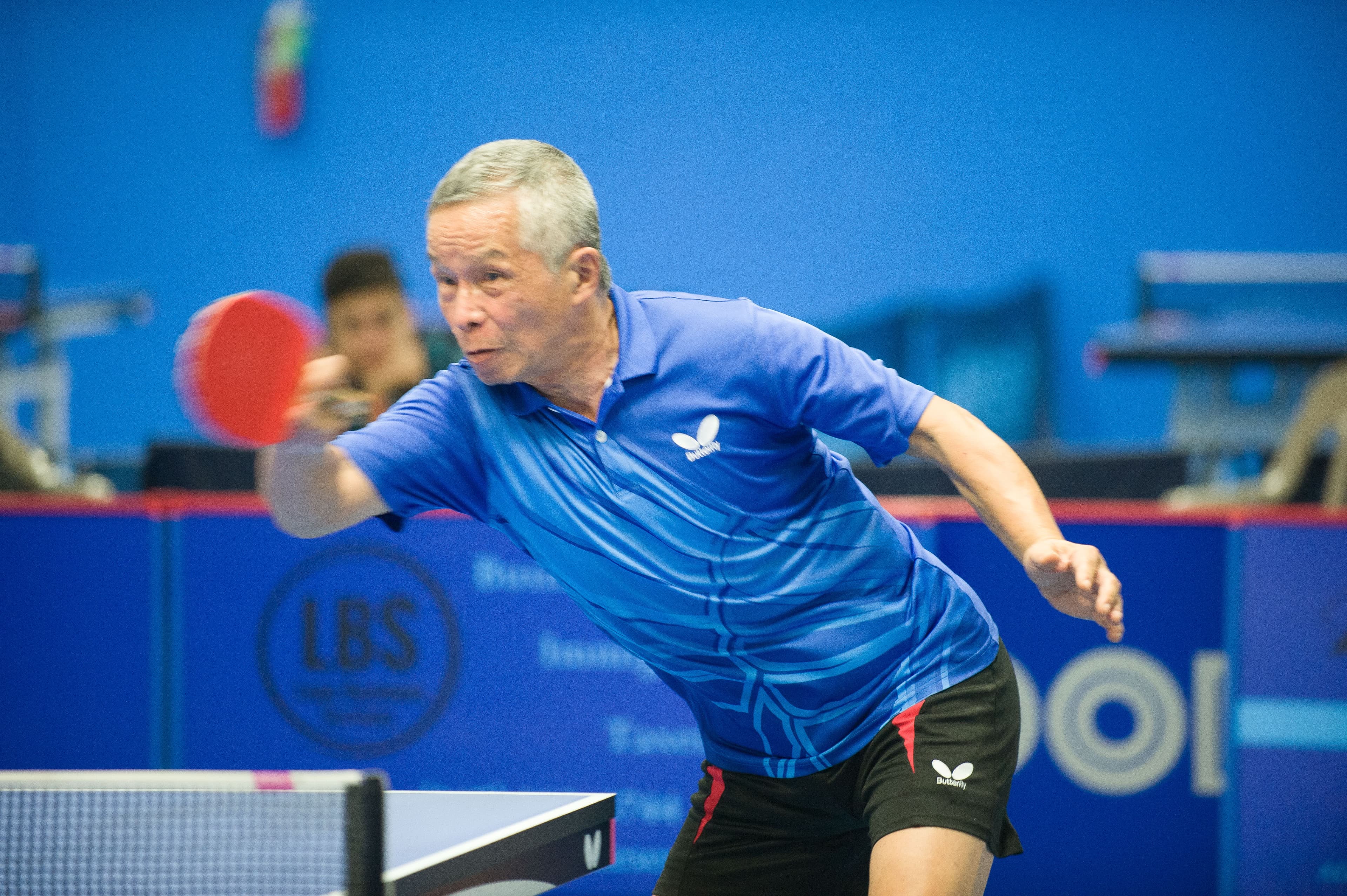 Player driving a forehand at Broward Table Tennis Club