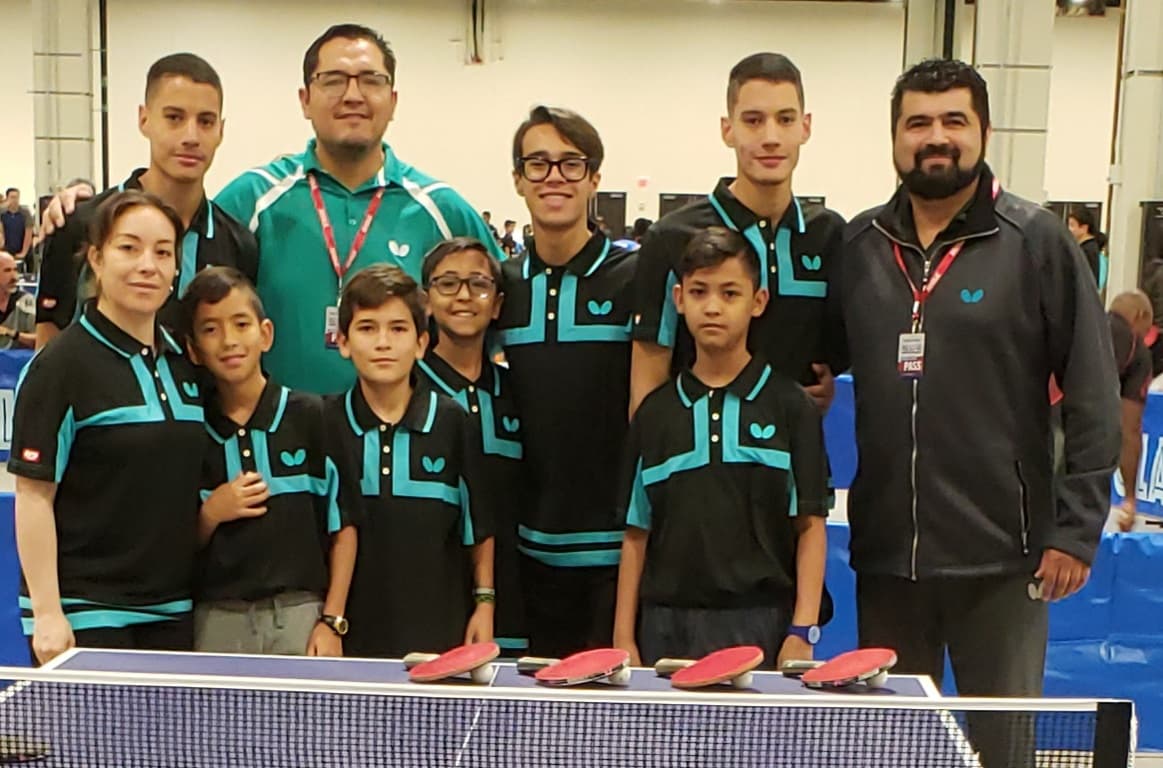 Coach David Bonilla with athletes