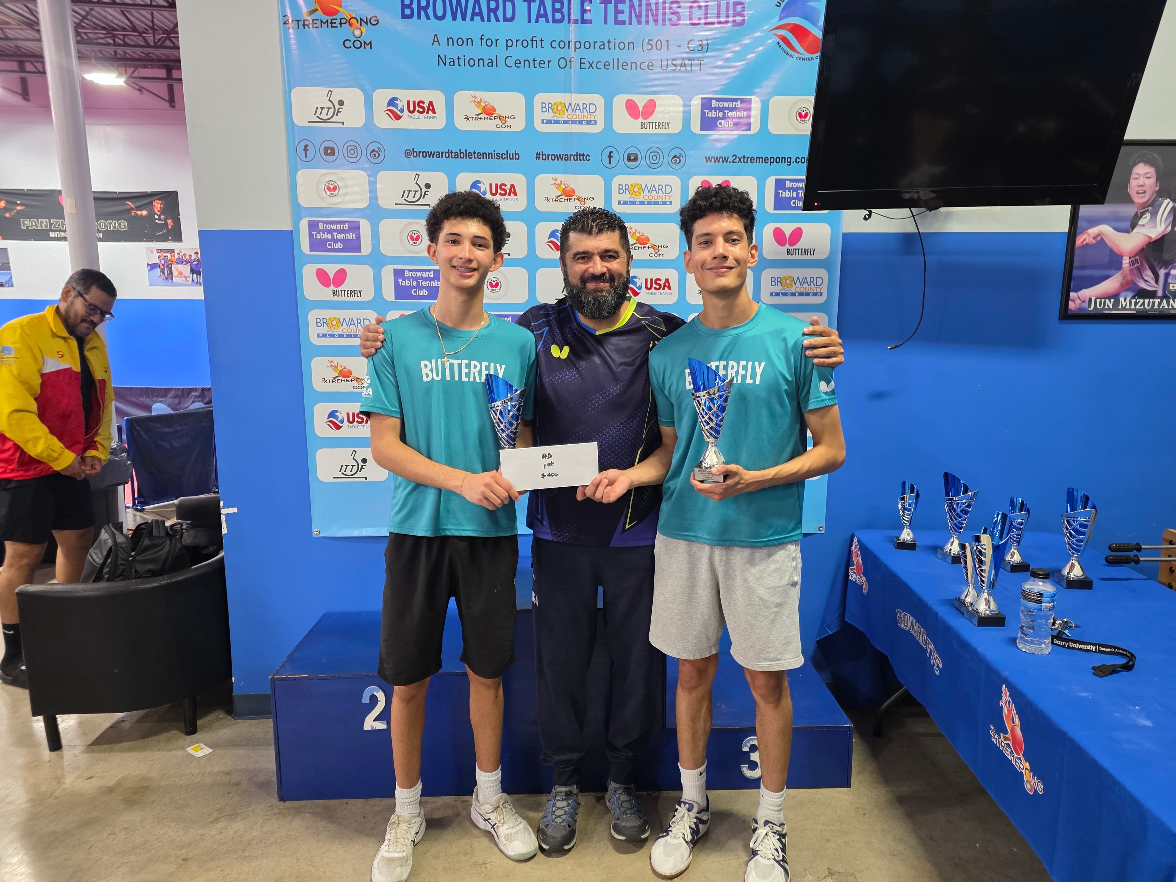 Coach David Bonilla with tournament winners